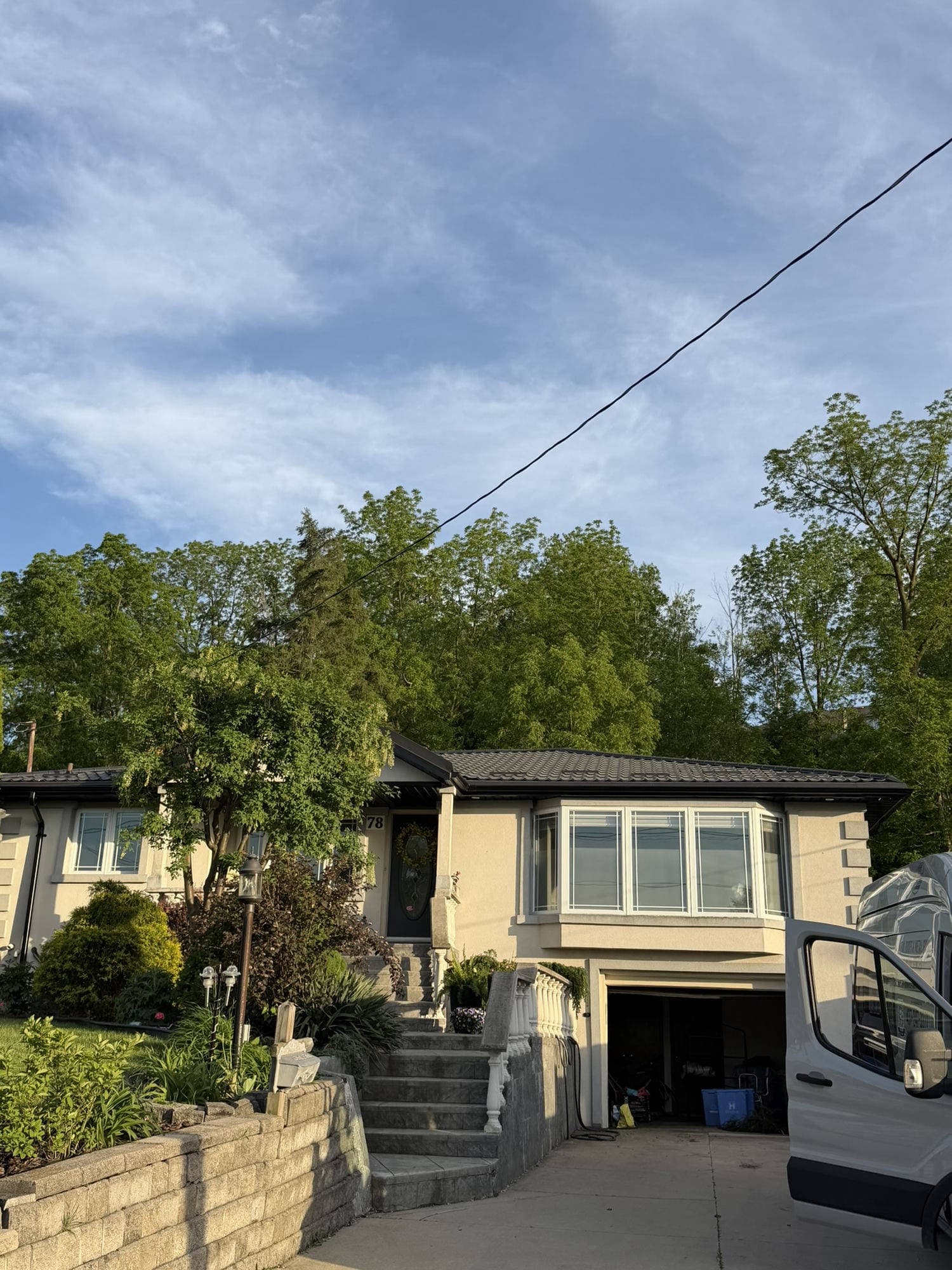 Dark metal tile roof on residential home — VAH Construction